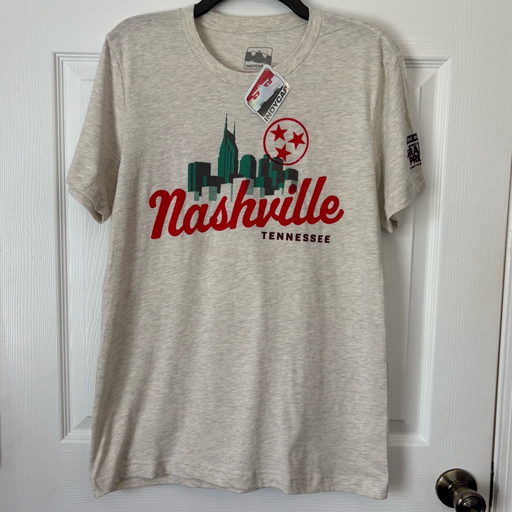 Tan Men’s IndyCar Graphic Tee with Red Stars and Skyline Men’s Size Medium